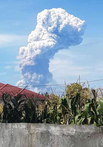 Volcano erupts on same Indonesian island as earlier quake