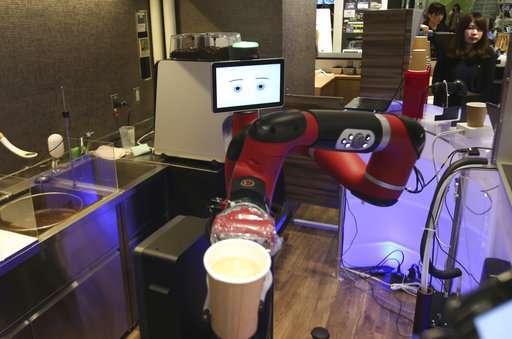 Robot makes coffee at new cafe in Japan's capital