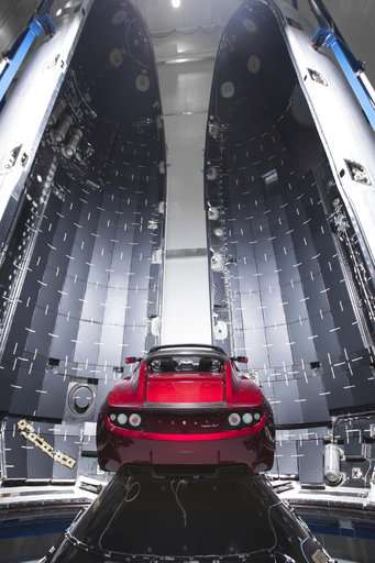 Showtime for SpaceX's big new rocket with sports car on top