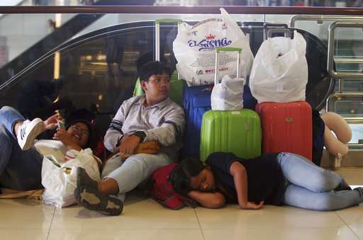 Bali airport closed as Agung volcano gushes column of ash