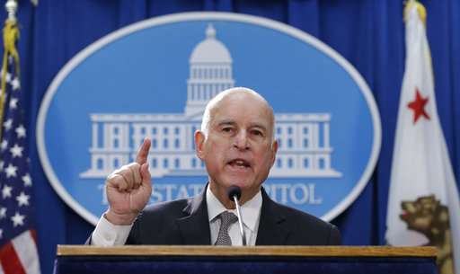 California sues over plan to scrap car emission standards