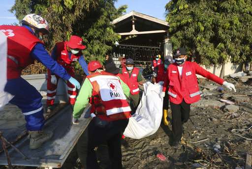 Hard-hit Indonesian city buries its dead as toll tops 840