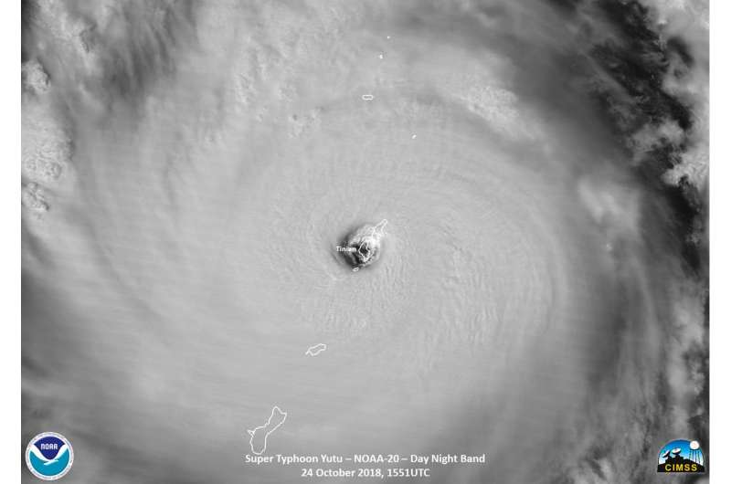 Satellite sees Supertyphoon Yutu's eye pass over Tinian