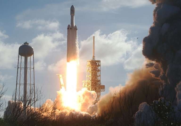 The SpaceX Falcon Heavy rocket lifts off in Cape Canaveral, Florida