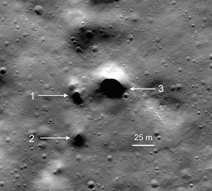 Possible lava tube skylights discovered near the North Pole of the Moon