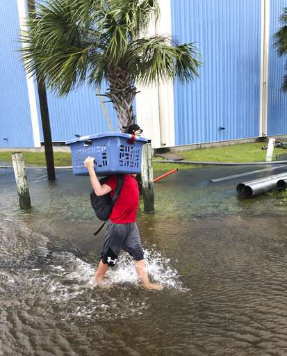 'Catching some hell': Hurricane Michael slams into Florida