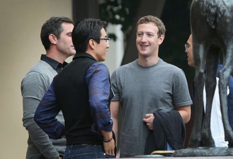Mark Zuckerberg has followed in Steve Jobs' sartorial footsteps, sporting a plain grey T-shirt every day for years