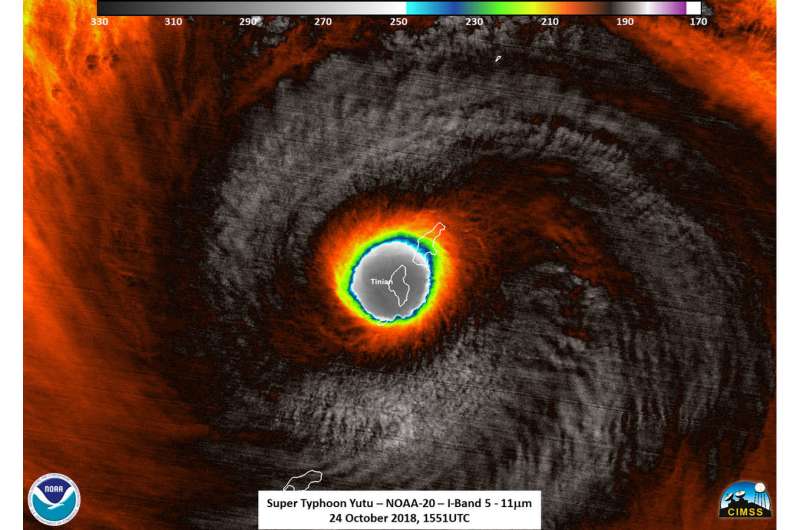 Satellite sees Supertyphoon Yutu's eye pass over Tinian