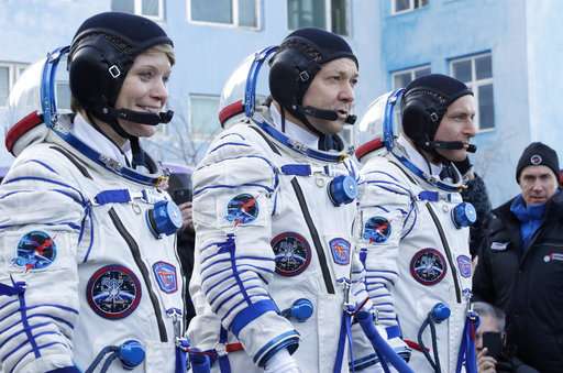 3 astronauts safely aboard International Space Station (Update)