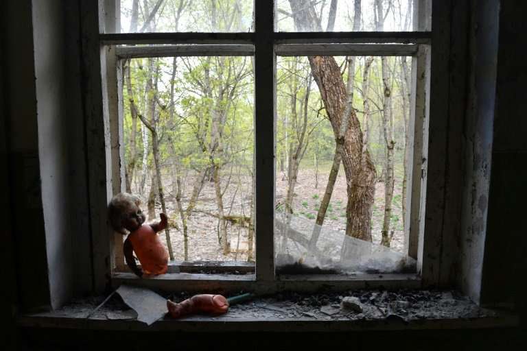 Abandoned kindergarten toys lay around in the ghost village of Kopachi near the Chernobyl nuclear power plant