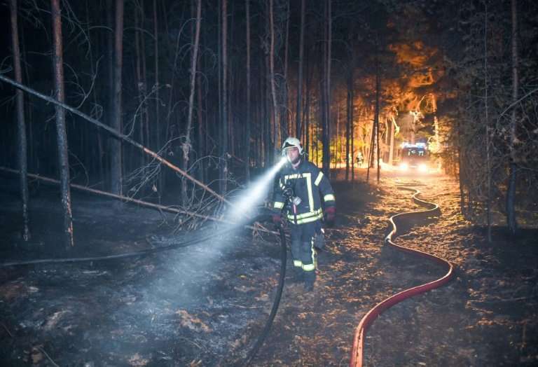 About 300 firefighters are trying to fight the blaze near Potsdam, which lies about 50 kilometres southwest of Berlin