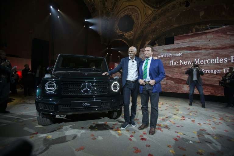 Actor and former California Governor Arnold Schwarzenegger (R) takes part in the unveilling of the new  Mercedes G-Class at the 
