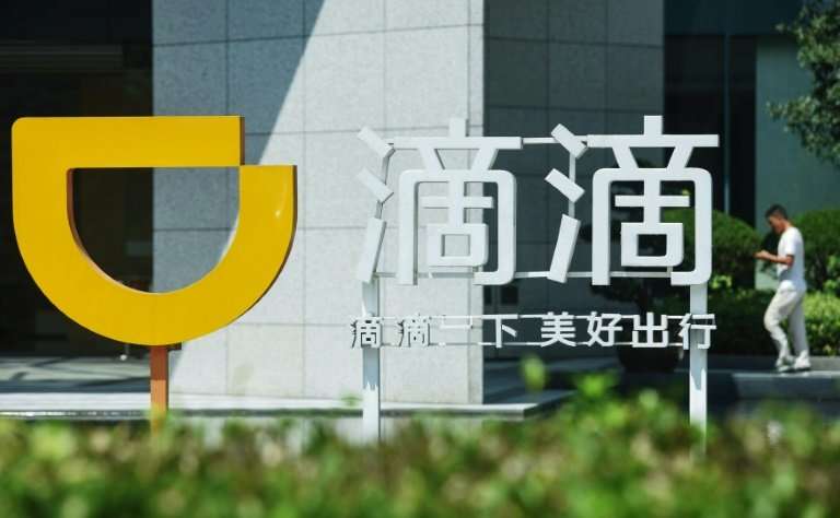 A logo of Didi Chuxing, the Chinese ride-hailing service that is expanding its presence in Mexico to compete with Uber