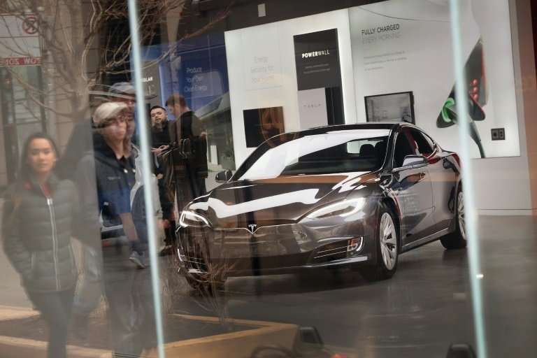 A Model S sits on the showroom floor at a Tesla dealership on March 30, 2018 in Chicago, Illinois