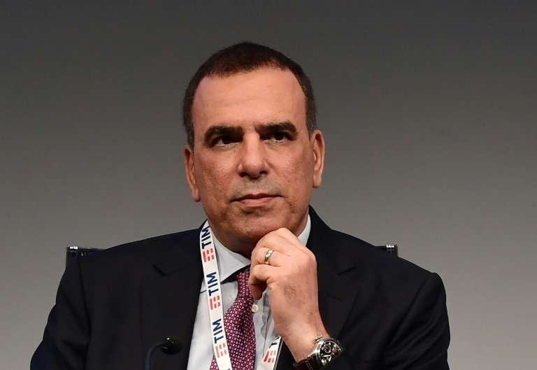 Amos Genish, seen here at the Telecom Italia shareholders meeting on Friday, will stay on as the comapny's CEO