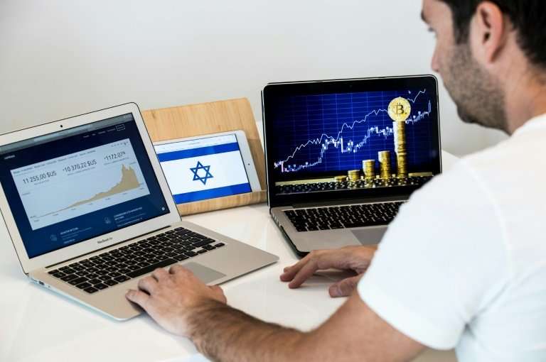 An Israeli consultant trades the cryptocurrency, bitcoin, online, in the Israeli city of Tel Aviv in this picture taken on Janua