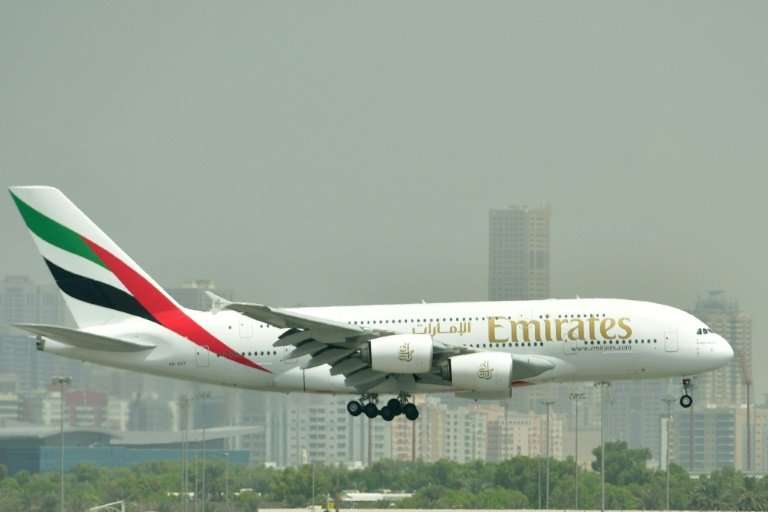 A picture from September 14, 2017 shows an Emirates Airbus A380 landing at Dubai's International Airport