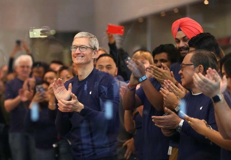 Apple CEO Tim Cook says the iPhone maker's repatriated profits will result in a $38 billion US tax payment and generate $350 bil