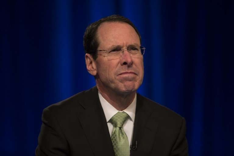 AT&amp;T chairman and CEO Randall Stephenson is fighting a Justice Department bid to block the telecom giant's merger with Time 