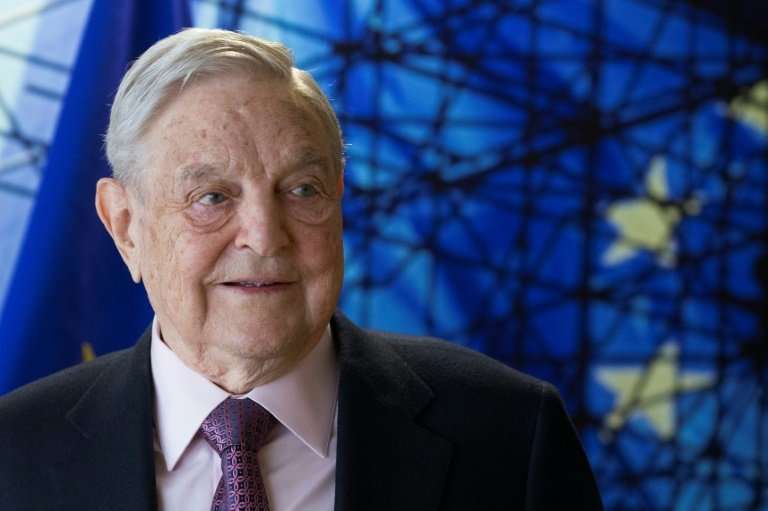 Billionaire investor George Soros took aim at Trump, tech giants and bitcoin in his speech at Davos
