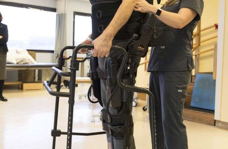 Bionic suit helps paralyzed patients stand and walk again