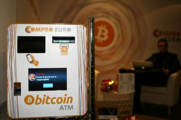 Bitcoin is called a virtual currency, but there are ways for investors to buy and sell the tokens including ATMs like this on in