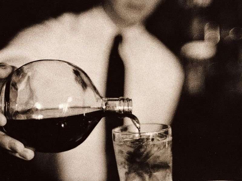 Booze may help or harm the heart, but income matters