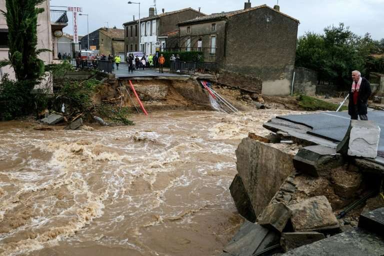 Bridges and roads collapsed as flash floods swamped towns around the fortress city of Carcassonne in southern France