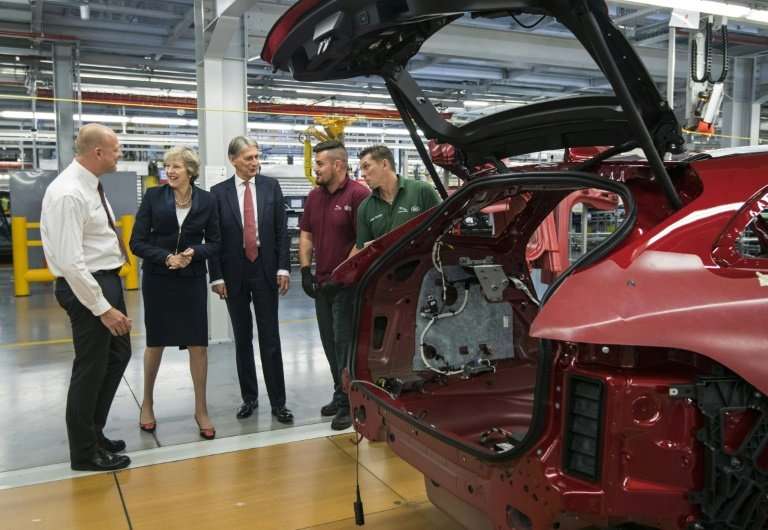 Britain's Society of Motor Manufacturers and Traders says it urgently needs clarity on the transitional arrangements for Brexit,