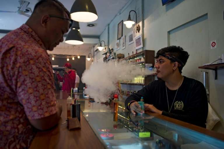 Chain-smoking Indonesia is moving to stub out its booming e-cigarette sector, sparking criticism that the government is siding w