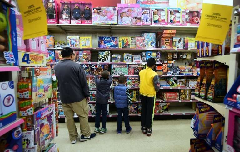 Children view board games at a Kmart store open early with Black Friday sales on Thanksgiving Day in Rosemead, California on Nov