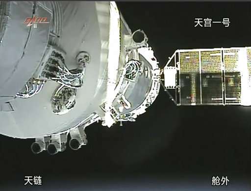 China's defunct space lab hurtling toward Earth for re-entry