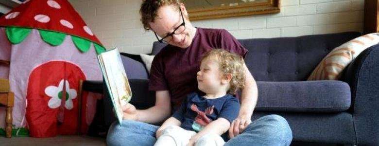 Dad's reading is new chapter of child language development