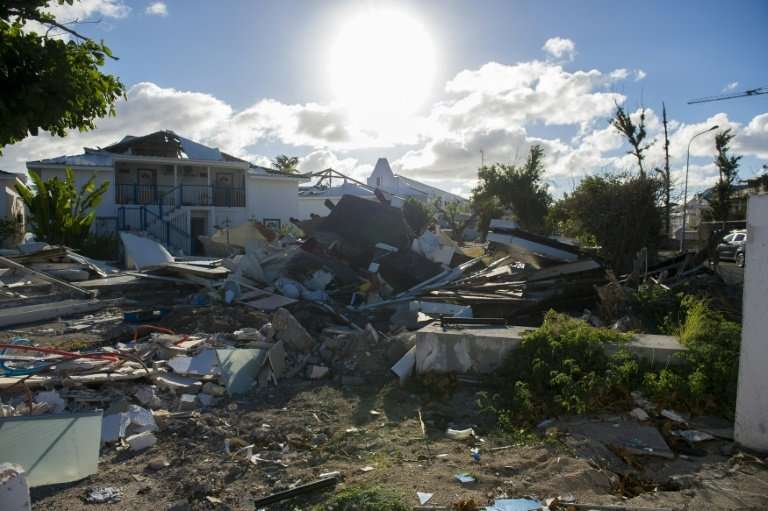 Debris-strewn Nettle Bay on Saint-Martin, as authorities and construction companies press on with a mass clean-up operation befo