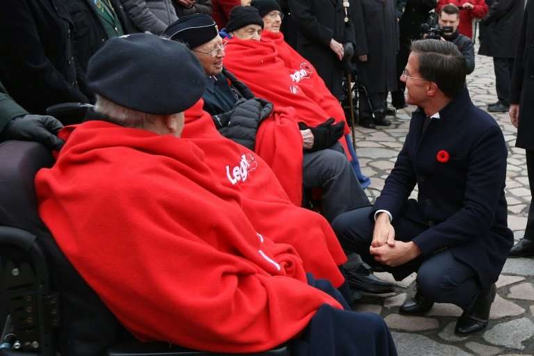 Dutch Prime Minister Mark Rutte is seen here greeting veterans after laying a wreath at the National War Memorial in Ottawa, Ont