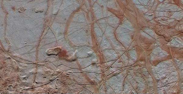 Europa and other planetary bodies may have extremely low-density surfaces