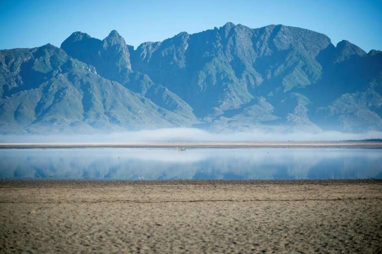 File picture taken May 10, 2017 shows bare sand and a narrow body of water at Theewaterskloof Dam, which has less than 20 percen