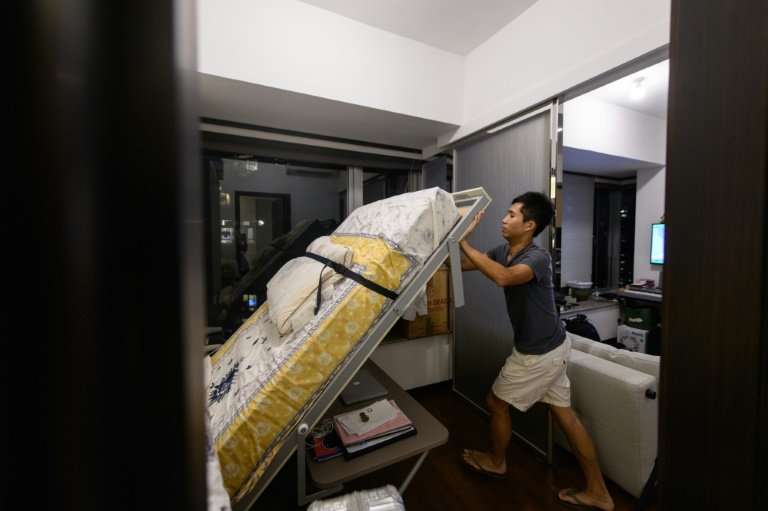 Finance worker Adrian Law, 25, paid more than US$765,000 for his 292 square foot (27 square metre) studio flat