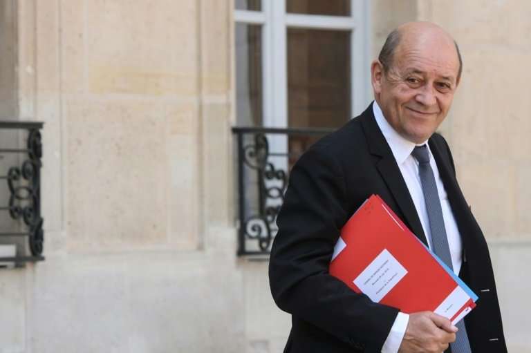 France's top diplomat Jean-Yves Le Drian called Washington's reimposition of sanctions on Iran &quot;unacceptable&quot;