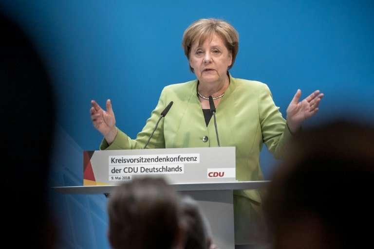 German Chancellor Angela Merkel has said her country, alongside Britain and France, will &quot;do everything&quot; to ensure Ira