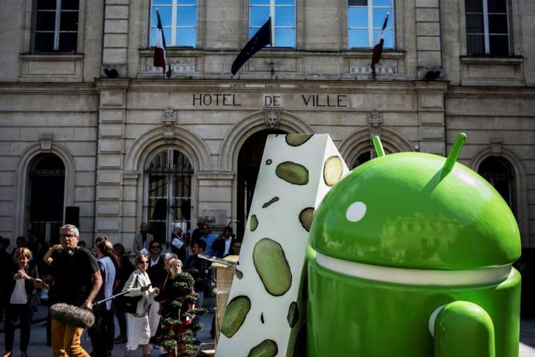 Google's Android operating system, a mascot of which is seen in this 2016 photo, has been the target of a long-running antitrust