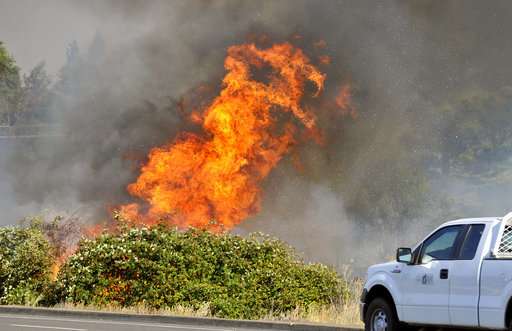 Growing fire shows potential for explosive Northwest season
