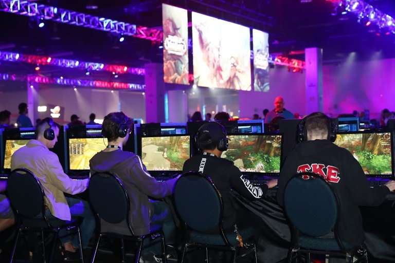 Guests demo the new World of Warcraft game at BlizzCon on November 3, 2017 in Anaheim, California