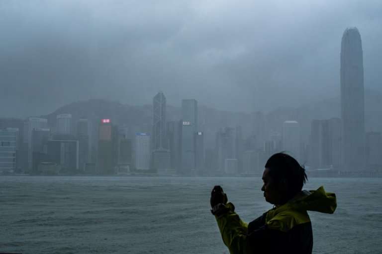 Hong Kong's observatory warned that Mangkhut would pass 100 kilometres south of the city as it raised the storm alert to its hig