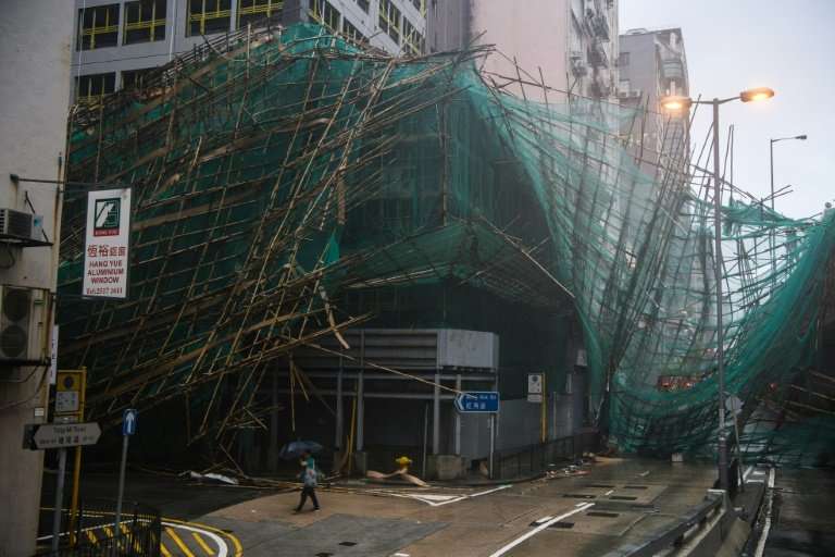 Hong Kong weather authorities issued their maximum alert for the storm, which hit the city with gusts of more than 230 kilometre