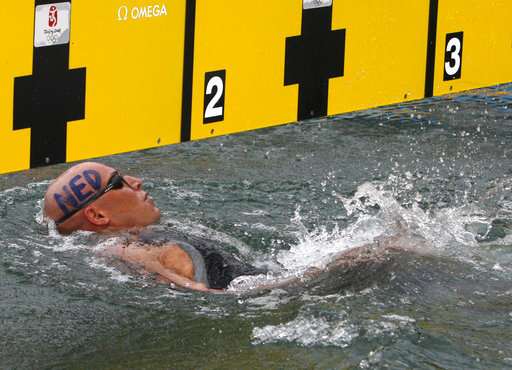 Ill health forces Dutch Olympian to halt long-distance swim