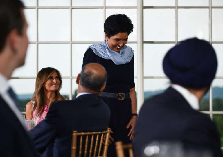 Indra Nooyi, seen here at a dinner for business leaders hosted by President Donald Trump and his wife Melania, left her job as h