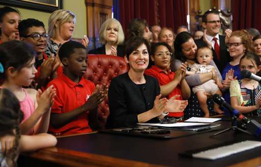 Iowa governor signs strictest abortion regulation in US
