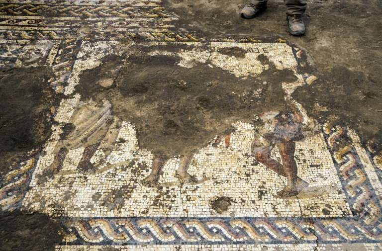 Israeli archaeologists have found a rare Roman-era mosaic depicting propsperous-looking men wearing togas during excavations at 