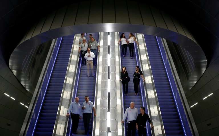 Israelis descend to the platforms of Yitzhak Navon station 80 metres (260 feet) below the streets of Jerusalem to test the new h
